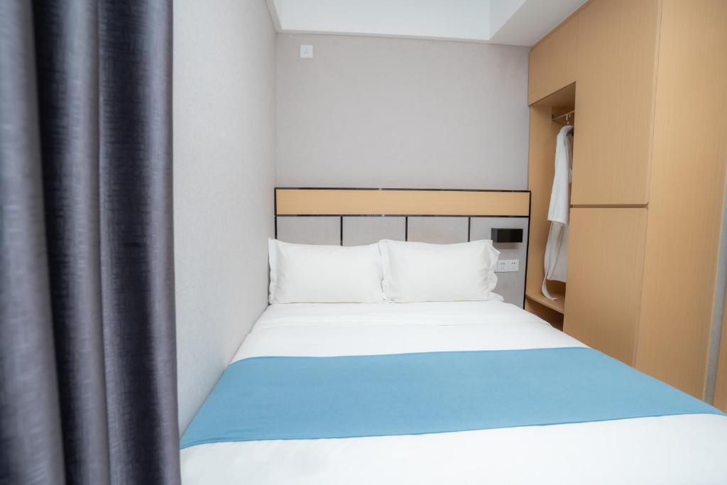 Postel nebo postele na pokoji v ubytování ARK HOTEL