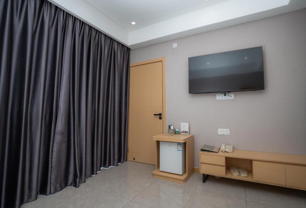 TV a/nebo společenská místnost v ubytování ARK HOTEL