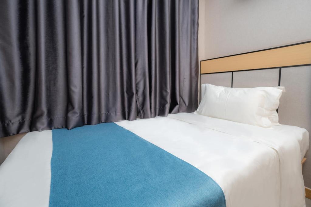 Postel nebo postele na pokoji v ubytování ARK HOTEL