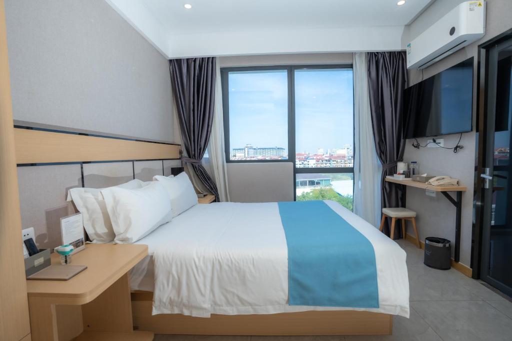 Postel nebo postele na pokoji v ubytování ARK HOTEL