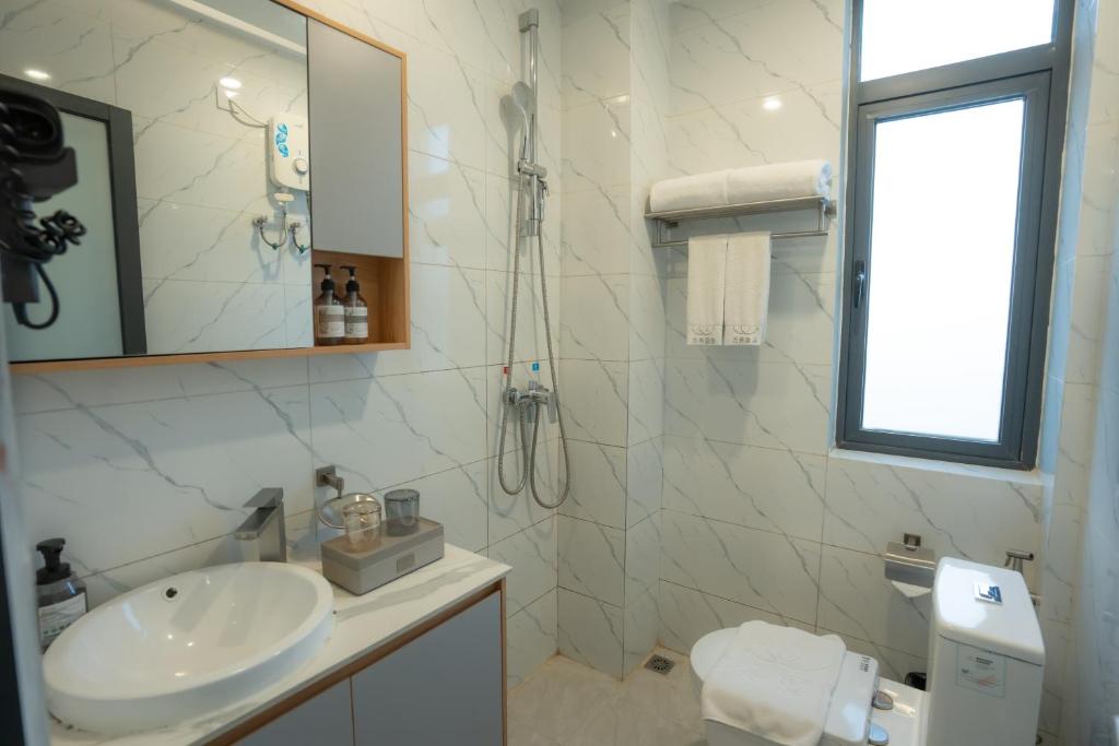 Koupelna v ubytování ARK HOTEL