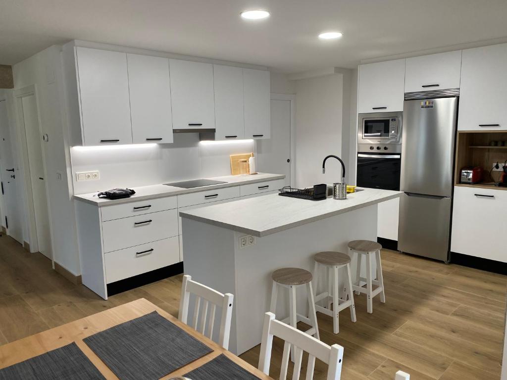 Kuchyň nebo kuchyňský kout v ubytování Apartamento Elkano 1