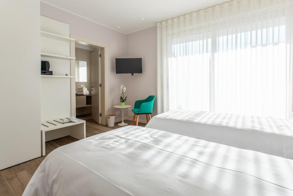 Postel nebo postele na pokoji v ubytování Re Ottone Rooms