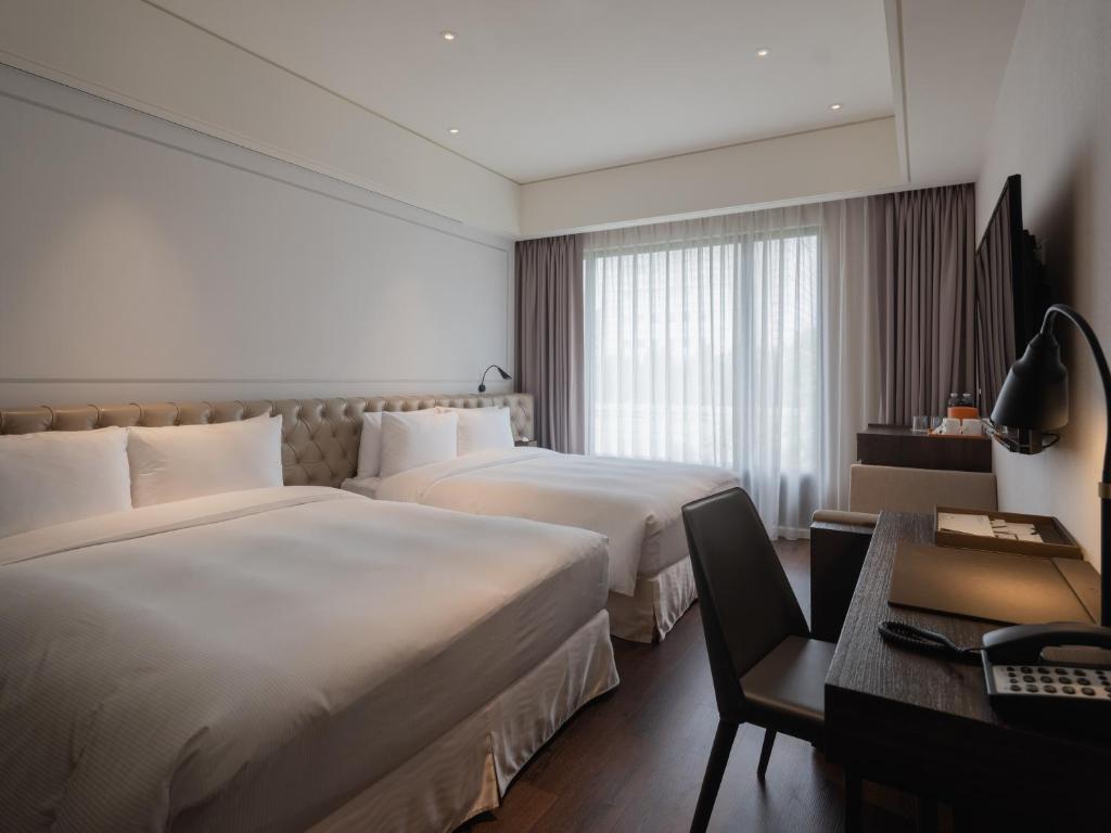 Postel nebo postele na pokoji v ubytování Hotel Mvsa+Michelin 2 Starred Molino de Urdàniz