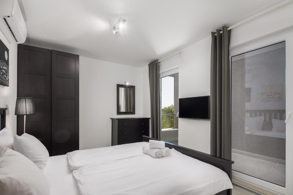 Postel nebo postele na pokoji v ubytování Villa Jolara With Heated Pool - Deluxe Suite 11