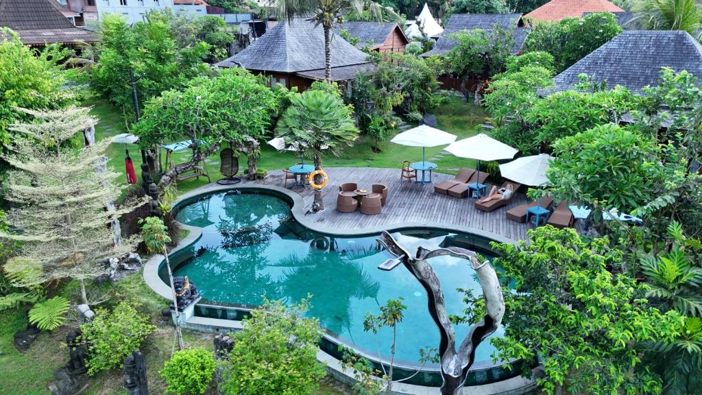 Bazén v ubytování Pangkung Carik Villa by Pramana Villas nebo v jeho okolí