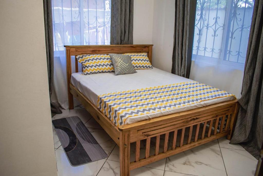Ένα ή περισσότερα κρεβάτια σε δωμάτιο στο Sea ExCape