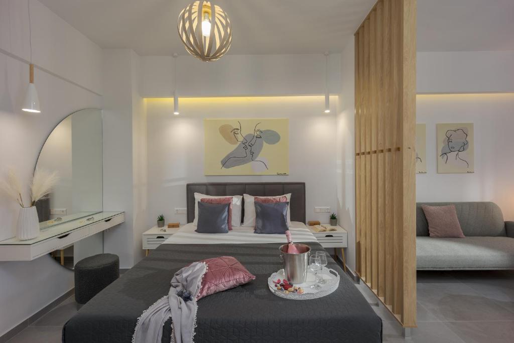 Postel nebo postele na pokoji v ubytování Myra Mare Suites by Estia