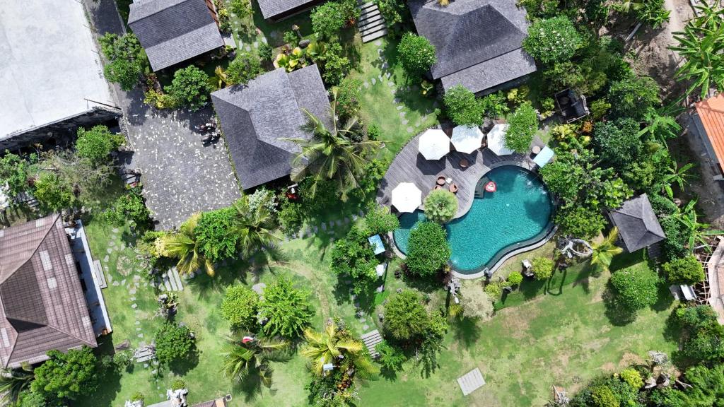 Bazén v ubytování Pangkung Carik Villa by Pramana Villas nebo v jeho okolí