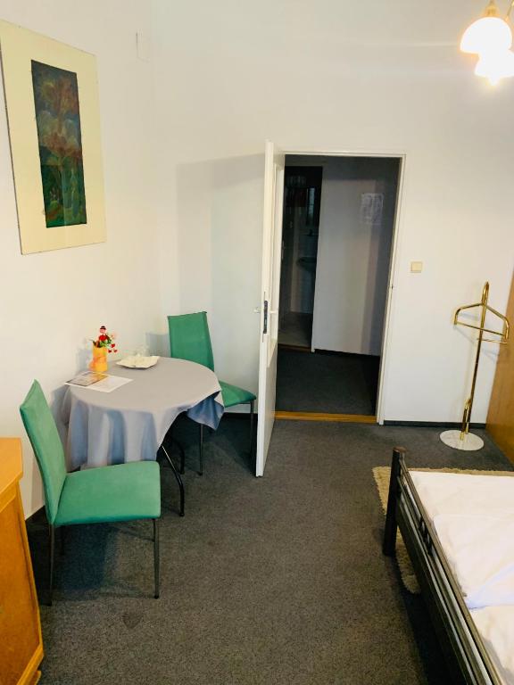 Postel nebo postele na pokoji v ubytování Hotel Slovan