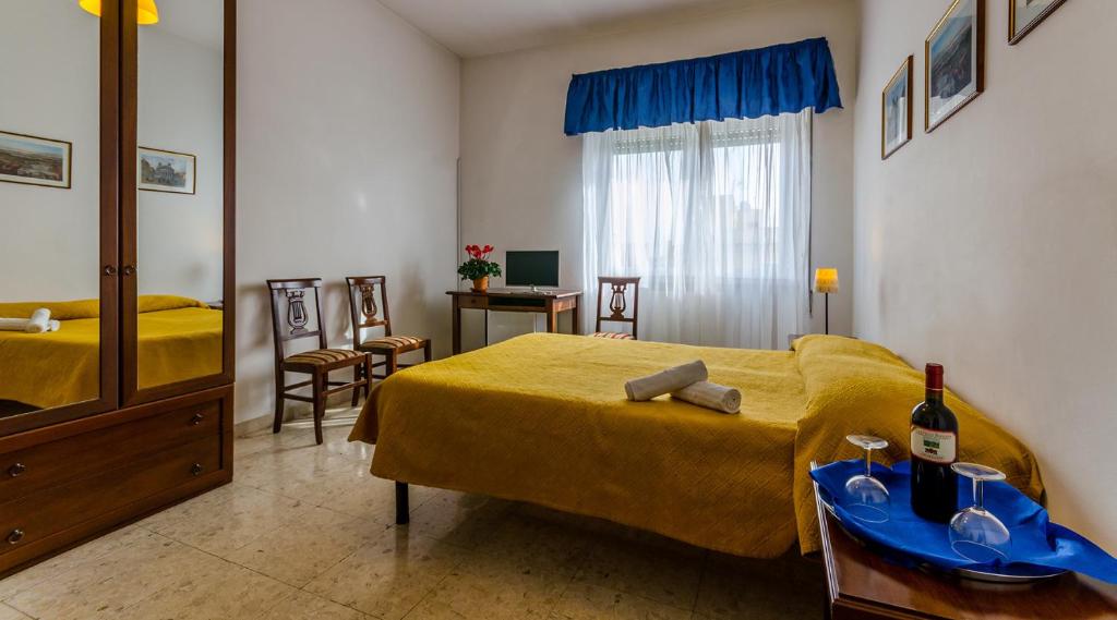 Postel nebo postele na pokoji v ubytování Hotel Antico Acquedotto