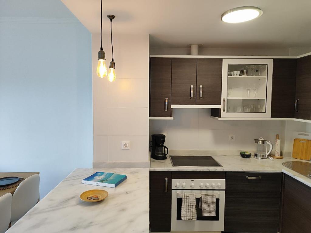 Kuchyň nebo kuchyňský kout v ubytování Apartamento Happy Days