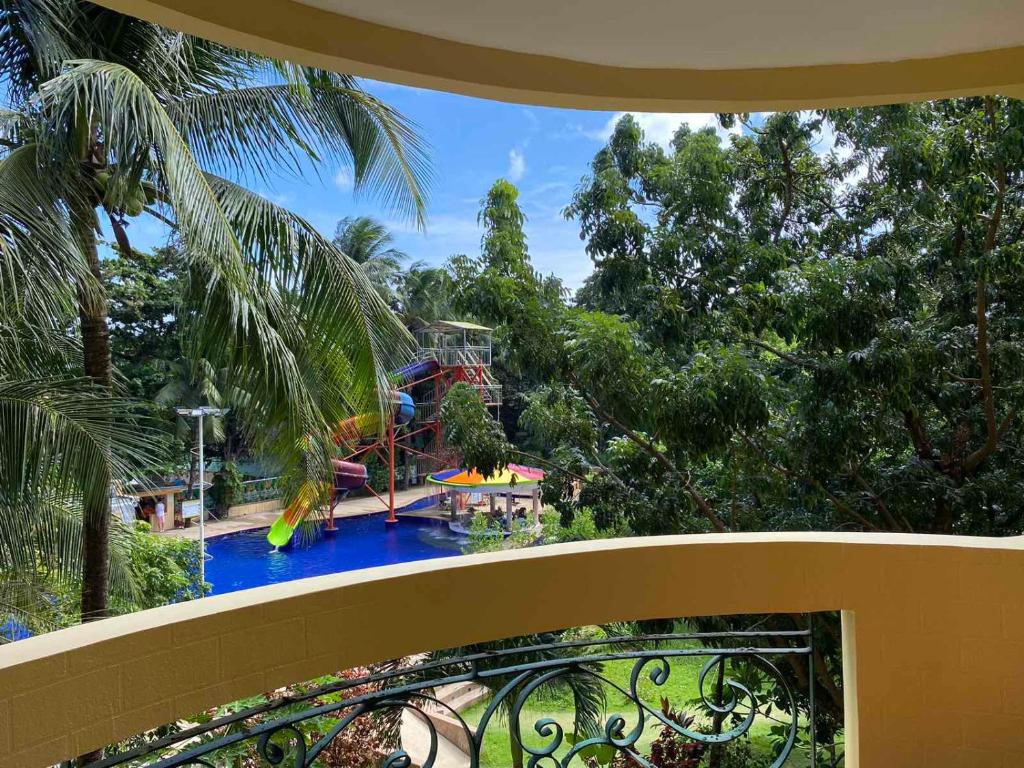 a view of a water park with a roller coaster at Paradise Garden Hotel and Convention Boracay Powered by ASTON in Boracay