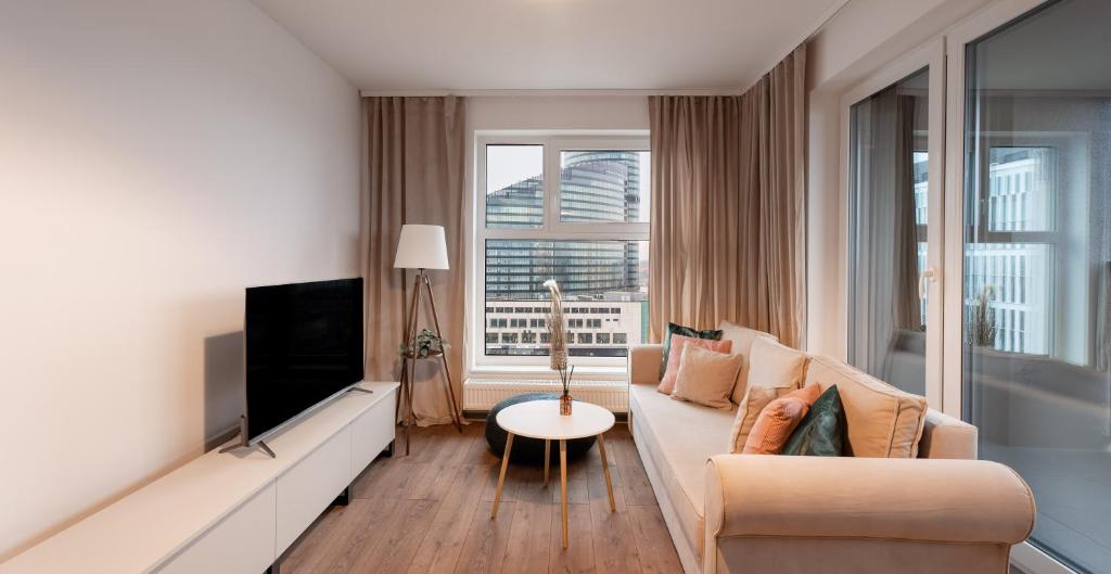 Televízia a/alebo spoločenská miestnosť v ubytovaní Pure Home Apartments - Gwiaździsta