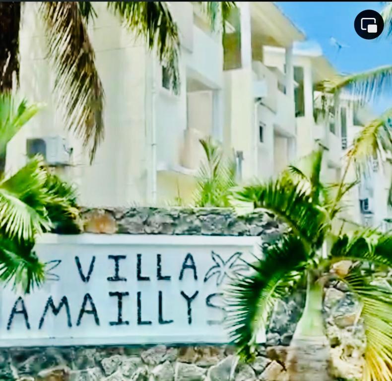 a sign that says villaaniaania in front of a building at Sea La Vie Villa in Grande Gaube