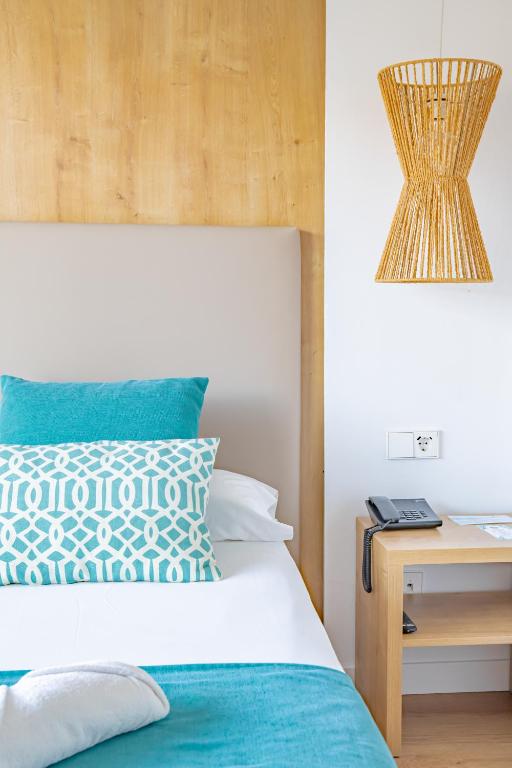 เตียงในห้องที่ Bahía de Alcudia Hotel & Spa