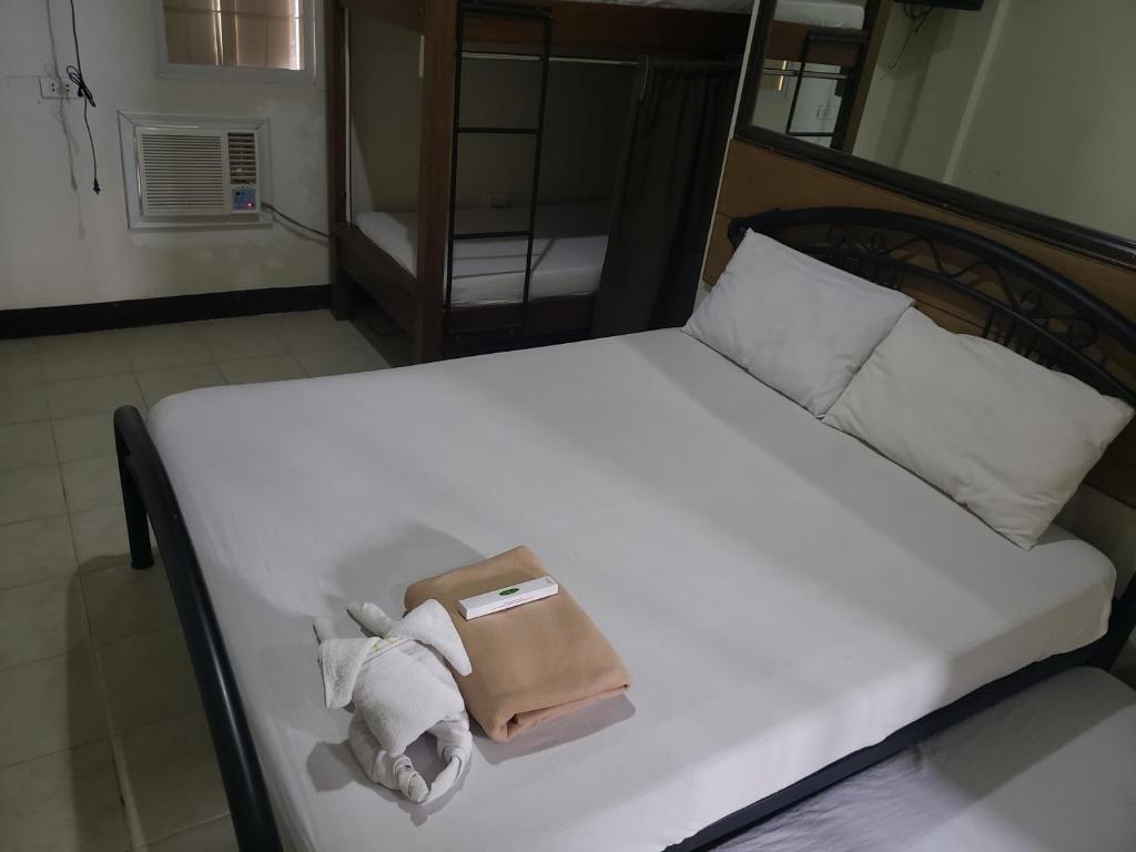 Postel nebo postele na pokoji v ubytování Le Verde Lodge