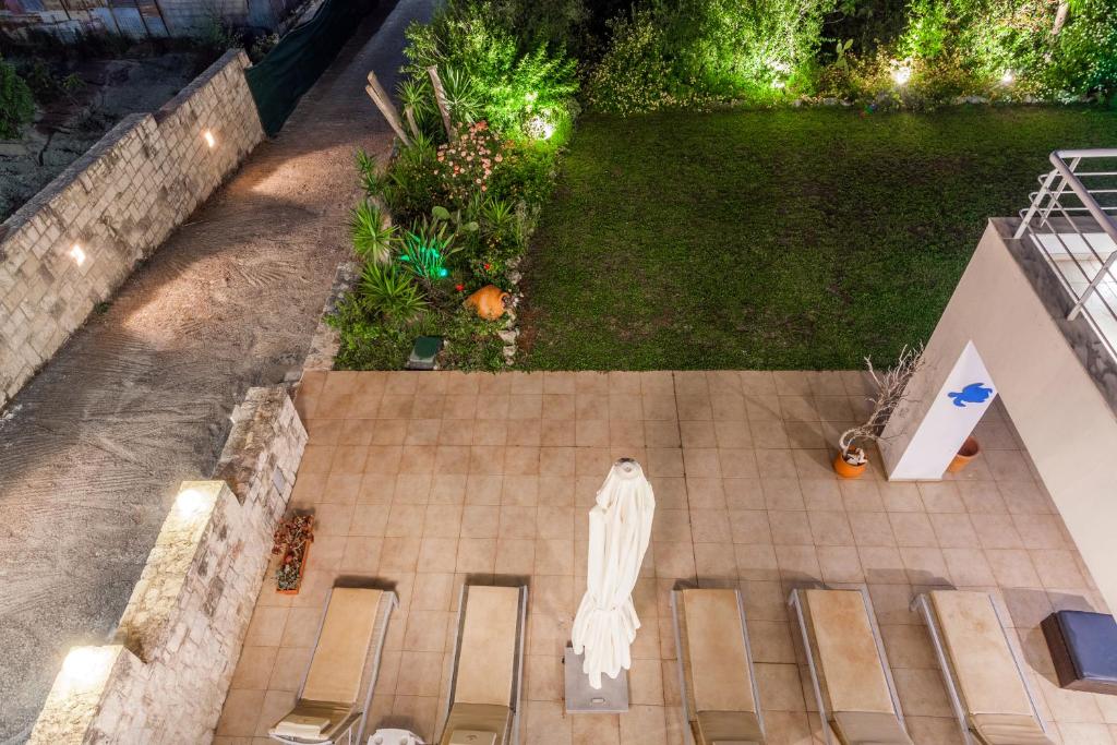 Zahrada ubytování WhiteBlue Spa Villa, By IdealStay Experience