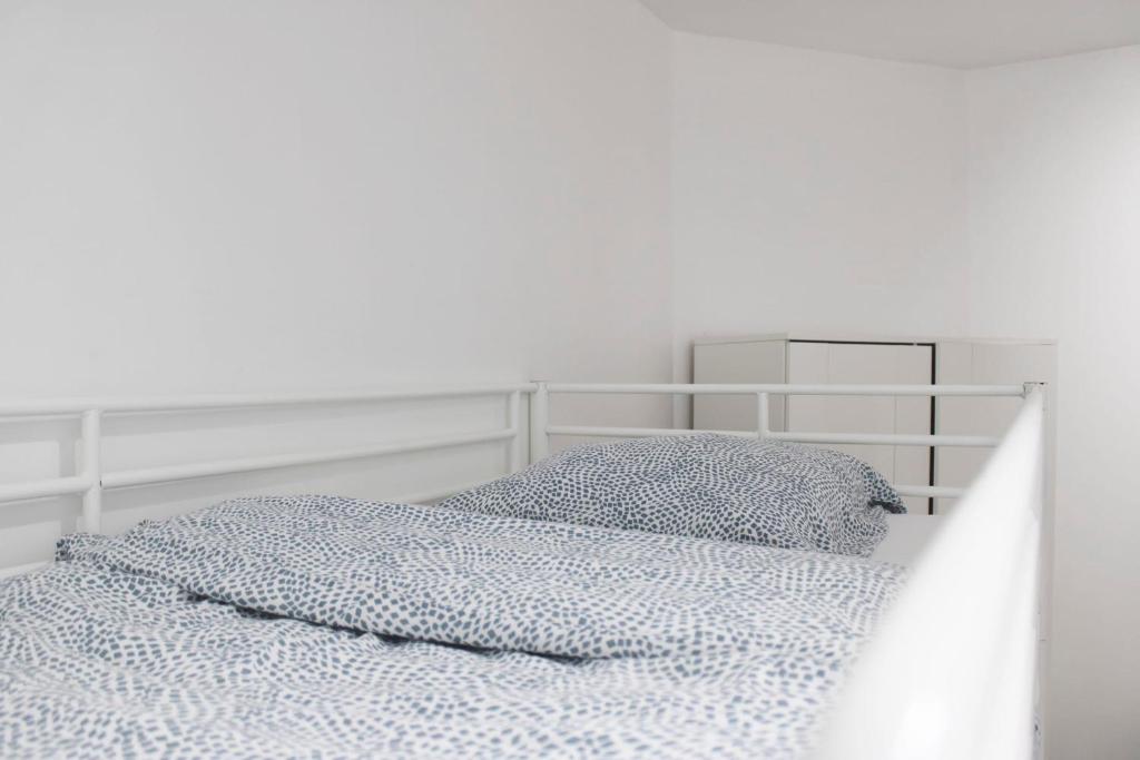 Łóżko lub łóżka w pokoju w obiekcie Bright studio located near Paris