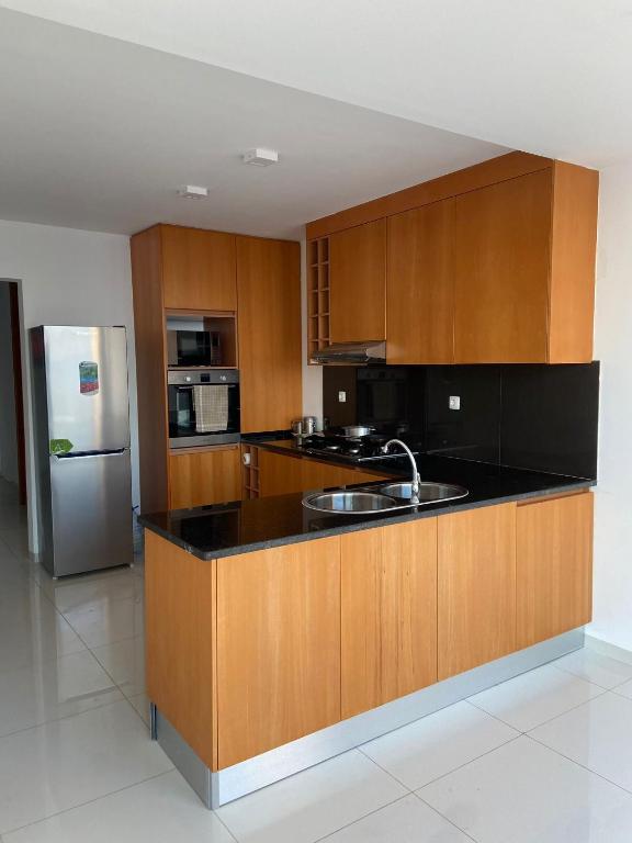 Kuchyň nebo kuchyňský kout v ubytování NICE DUPLEX, PRAIA
