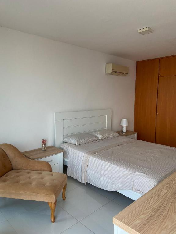Postel nebo postele na pokoji v ubytování NICE DUPLEX, PRAIA