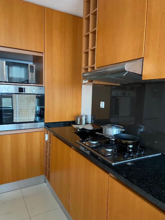 Kuchyň nebo kuchyňský kout v ubytování NICE DUPLEX, PRAIA