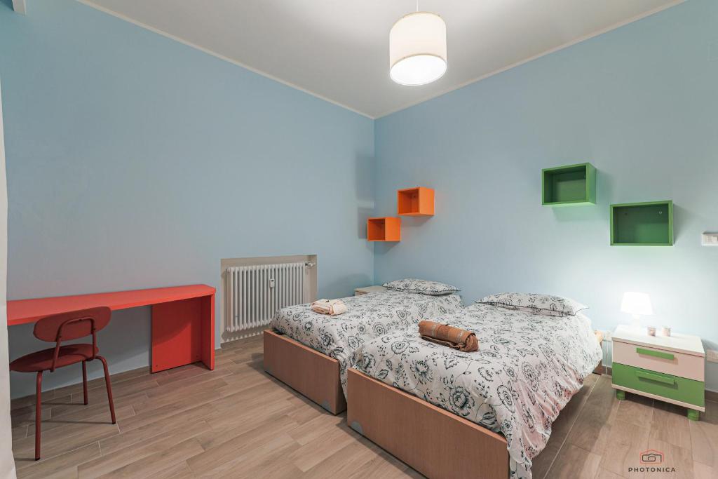 Łóżko lub łóżka w pokoju w obiekcie Casa di Ily