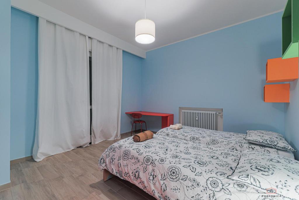 Łóżko lub łóżka w pokoju w obiekcie Casa di Ily