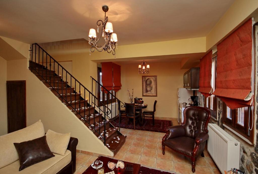 Posezení v ubytování Menalia Villas & Suites ΚΤΗΜΑ ΚΟΥΜΠΟΥΡΗ