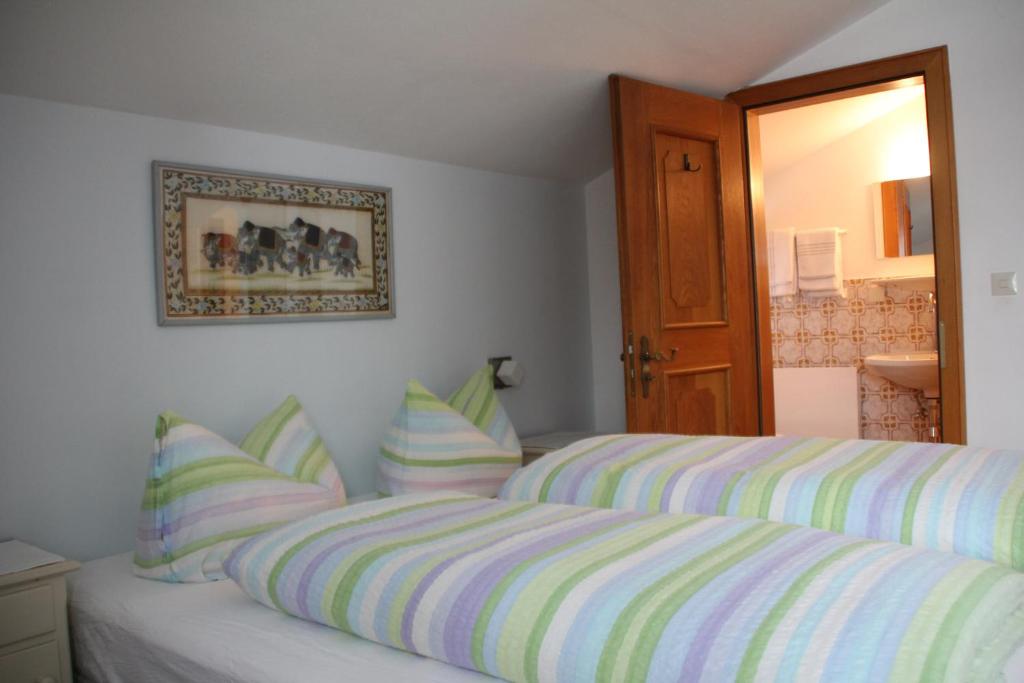 Postel nebo postele na pokoji v ubytování Haus Alice