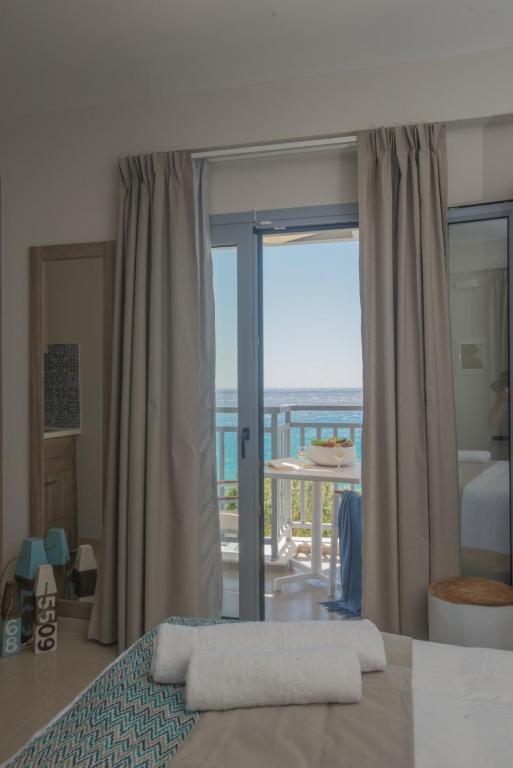 Postel nebo postele na pokoji v ubytování Athina Residence