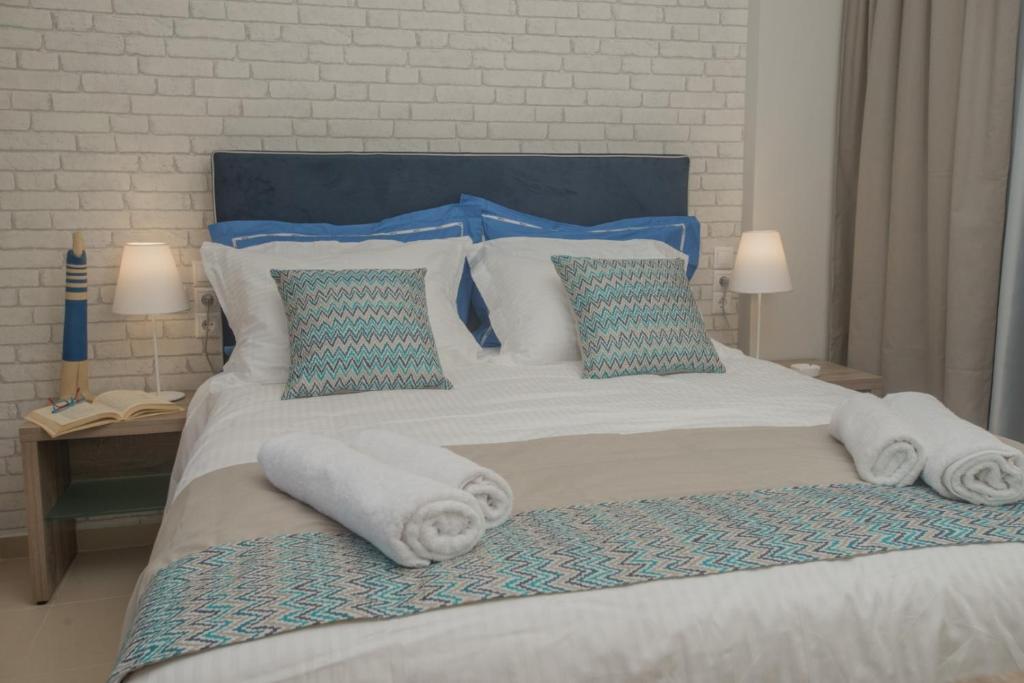 Postel nebo postele na pokoji v ubytování Athina Residence