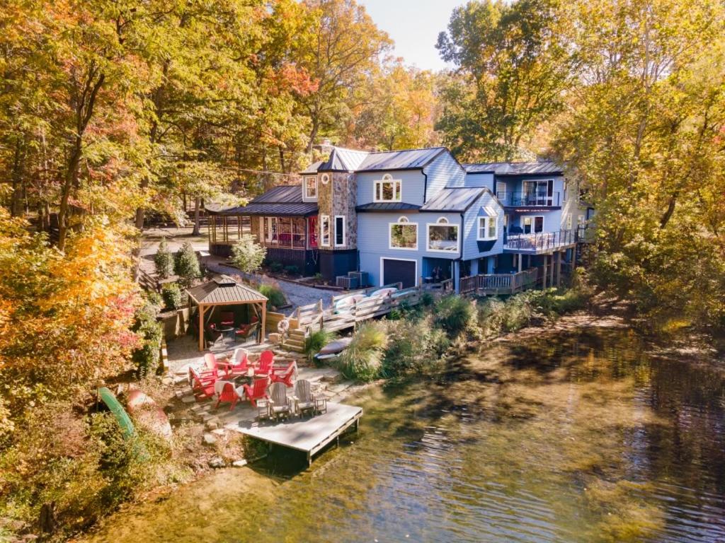 an aerial view of a house on a river at King Suites, Lakefront, Hot Tub, Watercraft in Harpers Ferry