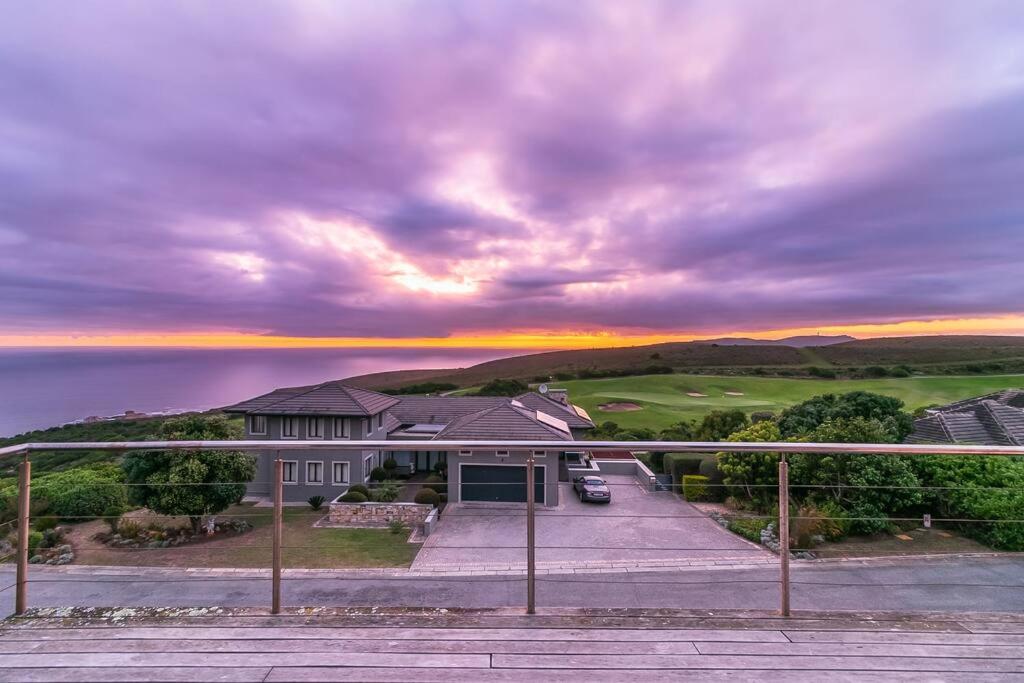 a house with a view of the ocean at Luxury Views + Excellence - Pezula no Loadshedding in Knysna