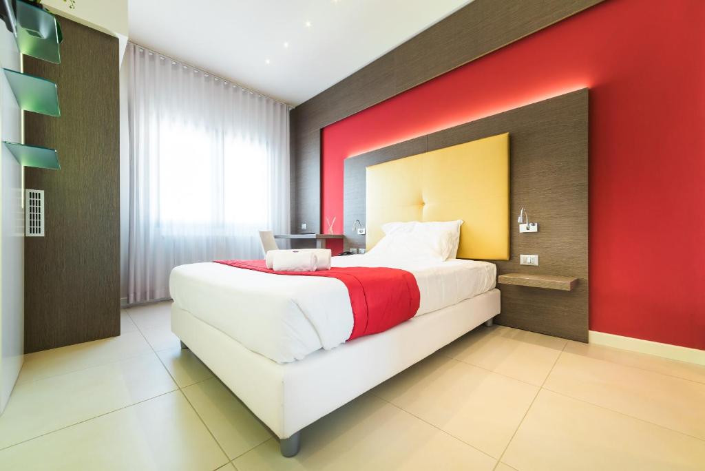 Postel nebo postele na pokoji v ubytování Hotel Calaluna