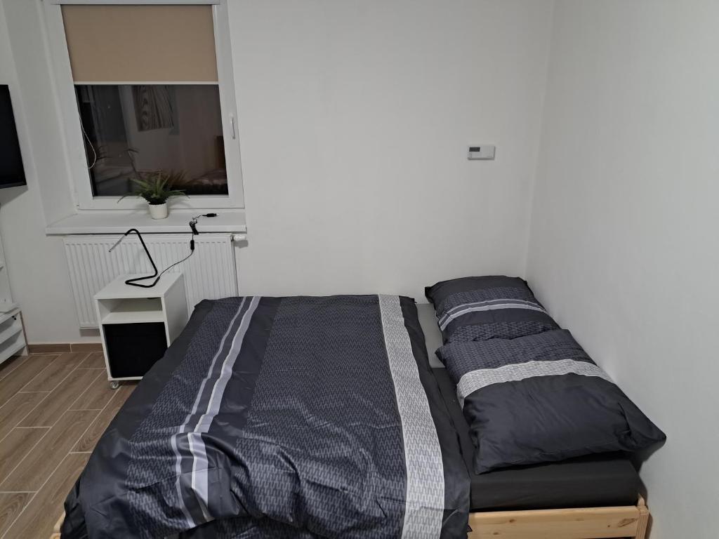 Postel nebo postele na pokoji v ubytování Penzion Labužník