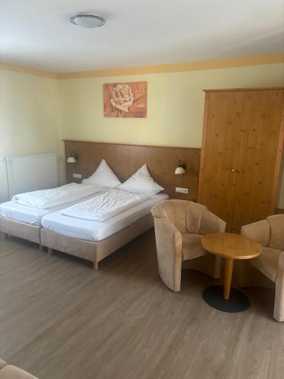 Postel nebo postele na pokoji v ubytování Marienhof