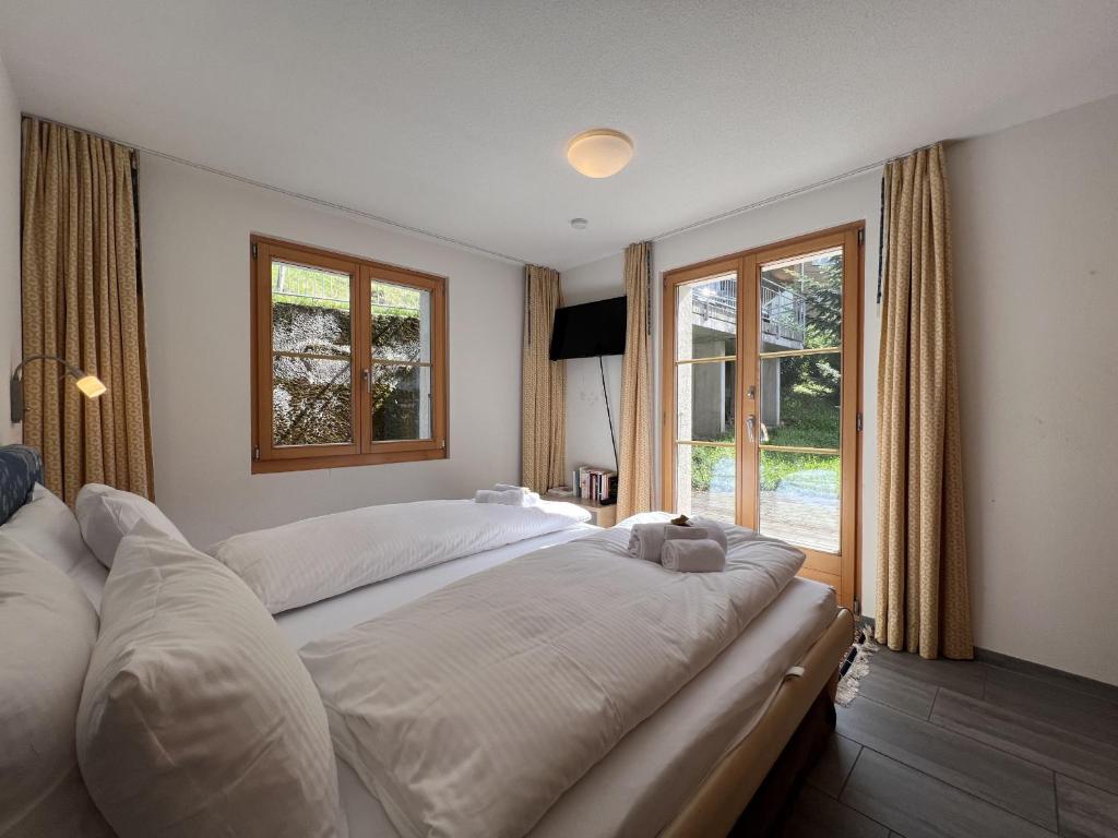 Postel nebo postele na pokoji v ubytování Chalet Bergrose 3