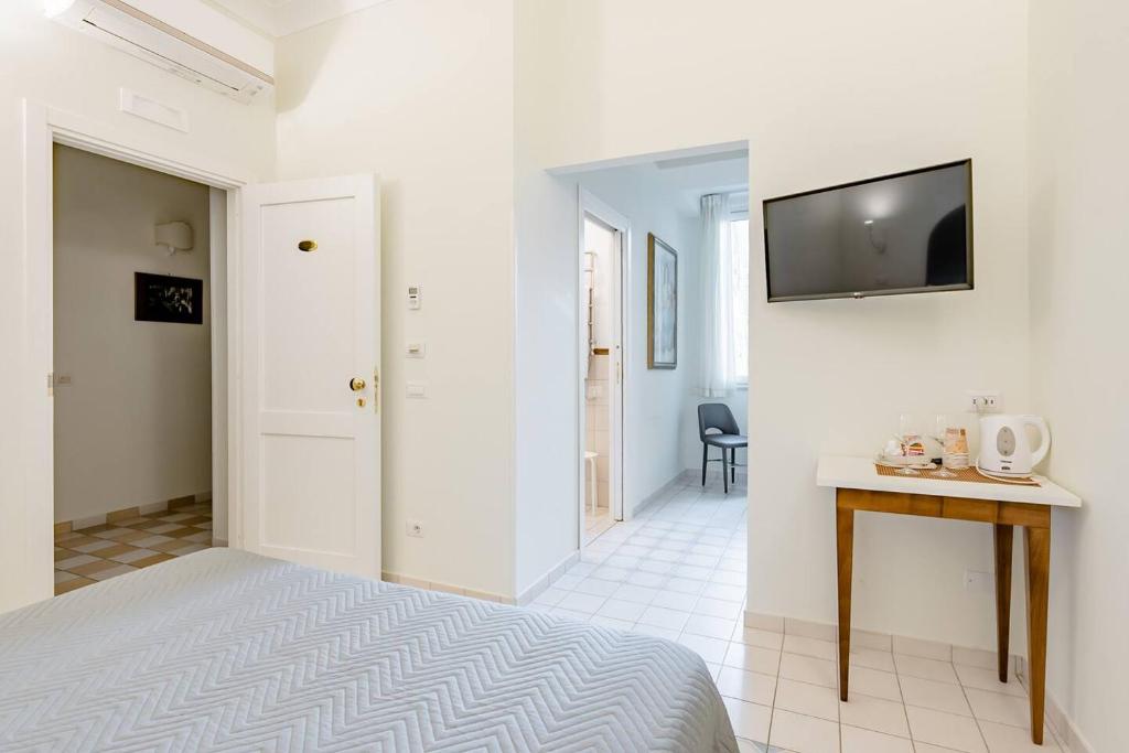 TV a/nebo společenská místnost v ubytování Rosa Magra Guest House