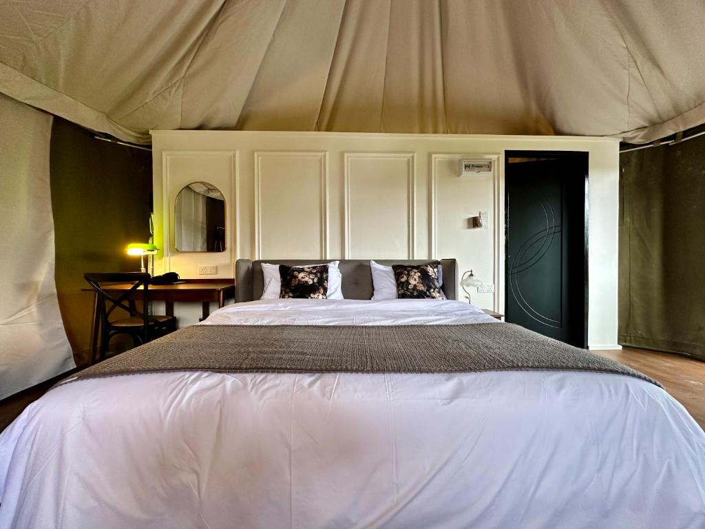 Letto o letti in una camera di kMah@SomerMansion