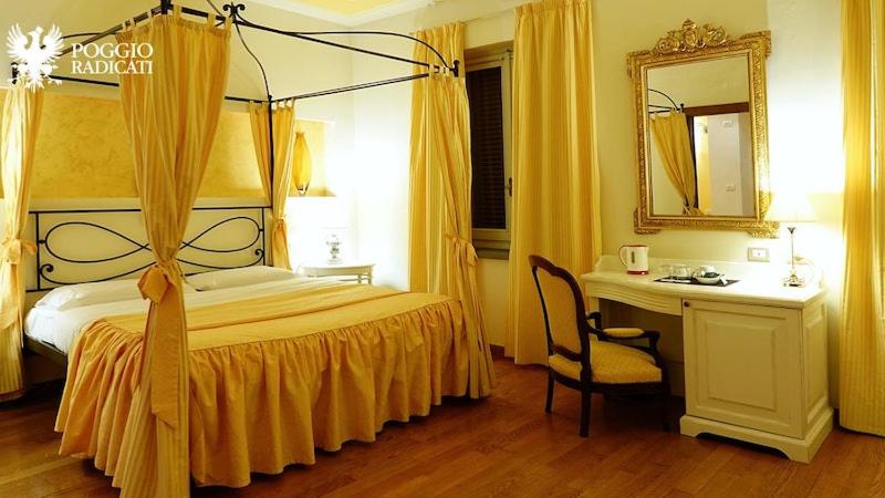Postel nebo postele na pokoji v ubytování Poggio Radicati Hotel De Charme