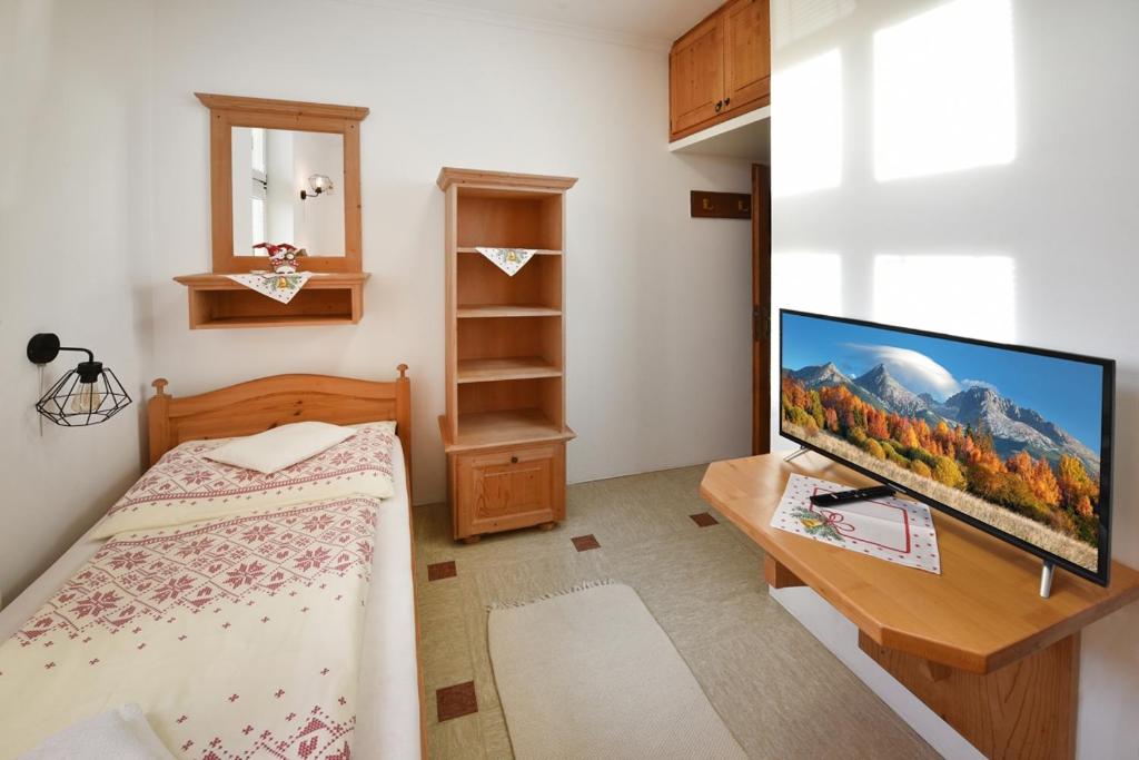 A television and/or entertainment centre at Vila Aurora - Vysoke Tatry