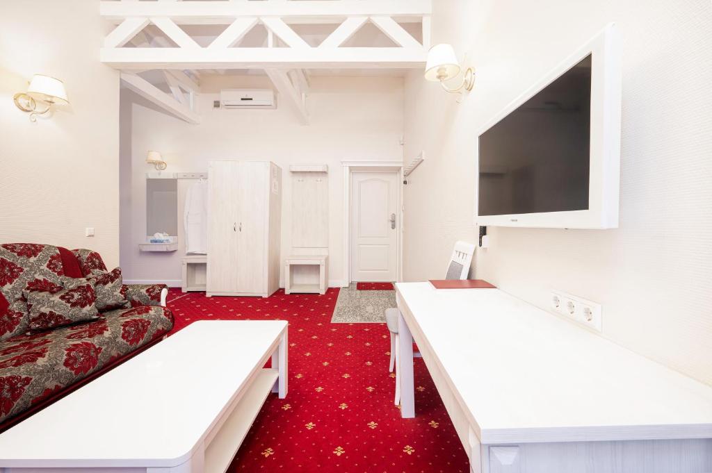 TV a/nebo společenská místnost v ubytování Art Hotel