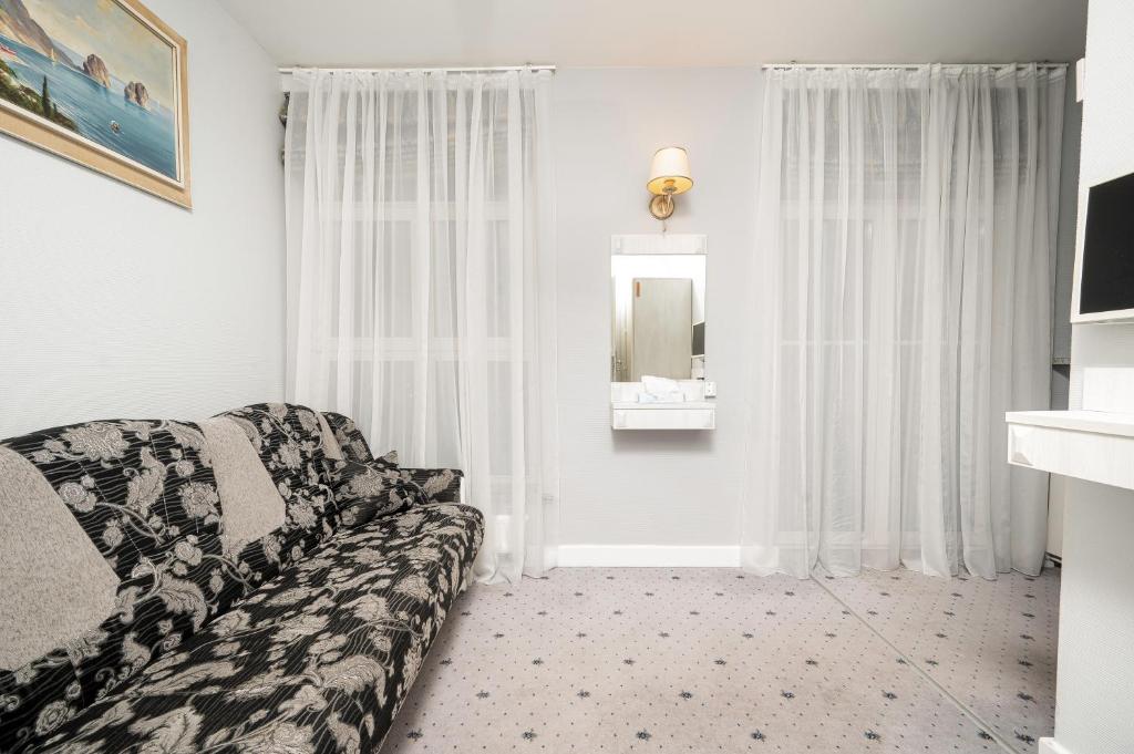 TV a/nebo společenská místnost v ubytování Art Hotel