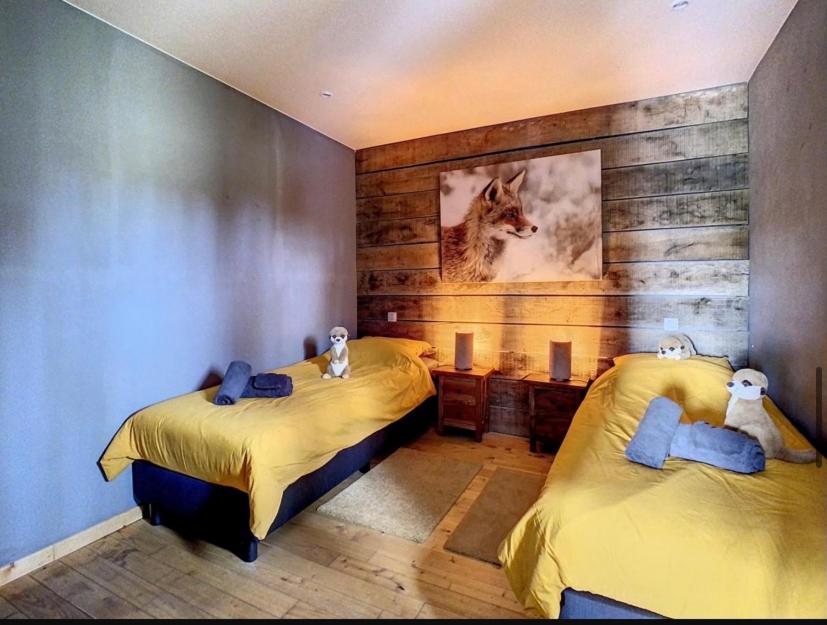 Postel nebo postele na pokoji v ubytování The Lodge Ardenne
