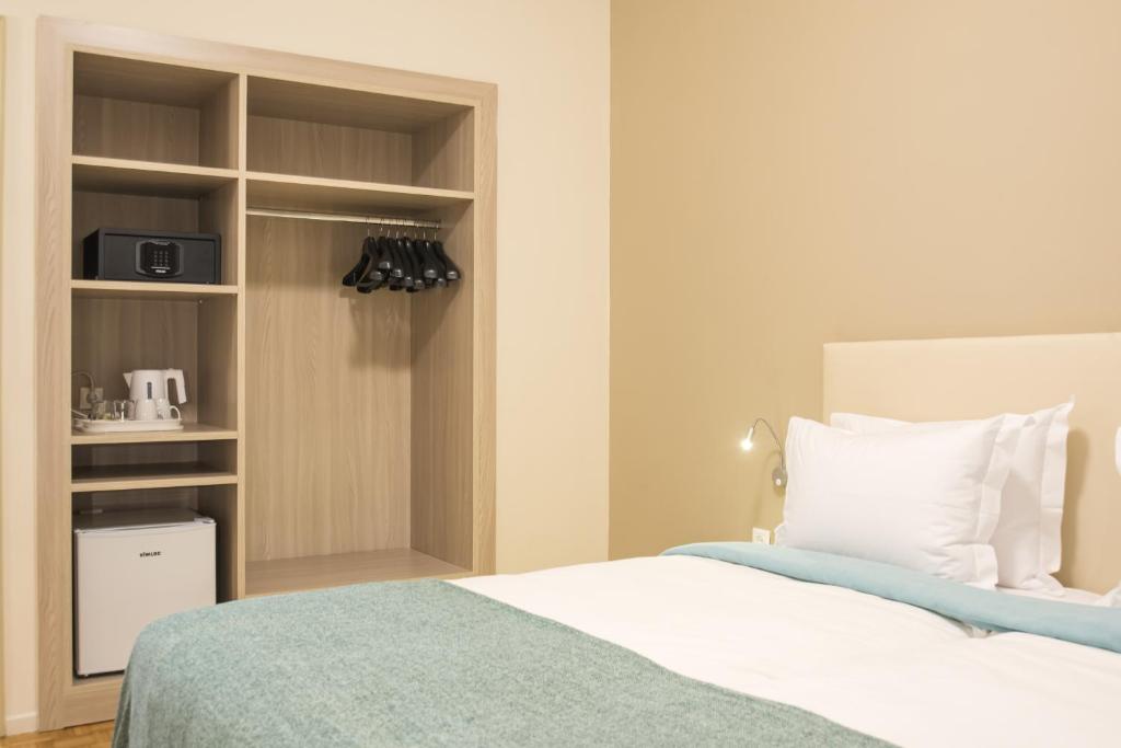 V Hotel Delphi客房内的一张或多张床位