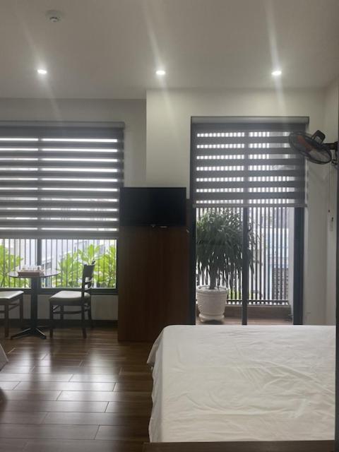 Postel nebo postele na pokoji v ubytování Tree Homestay