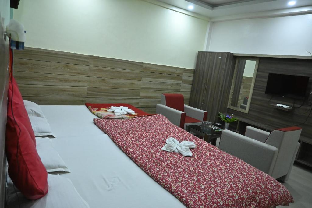 Postel nebo postele na pokoji v ubytování Rangamati Garden Resort