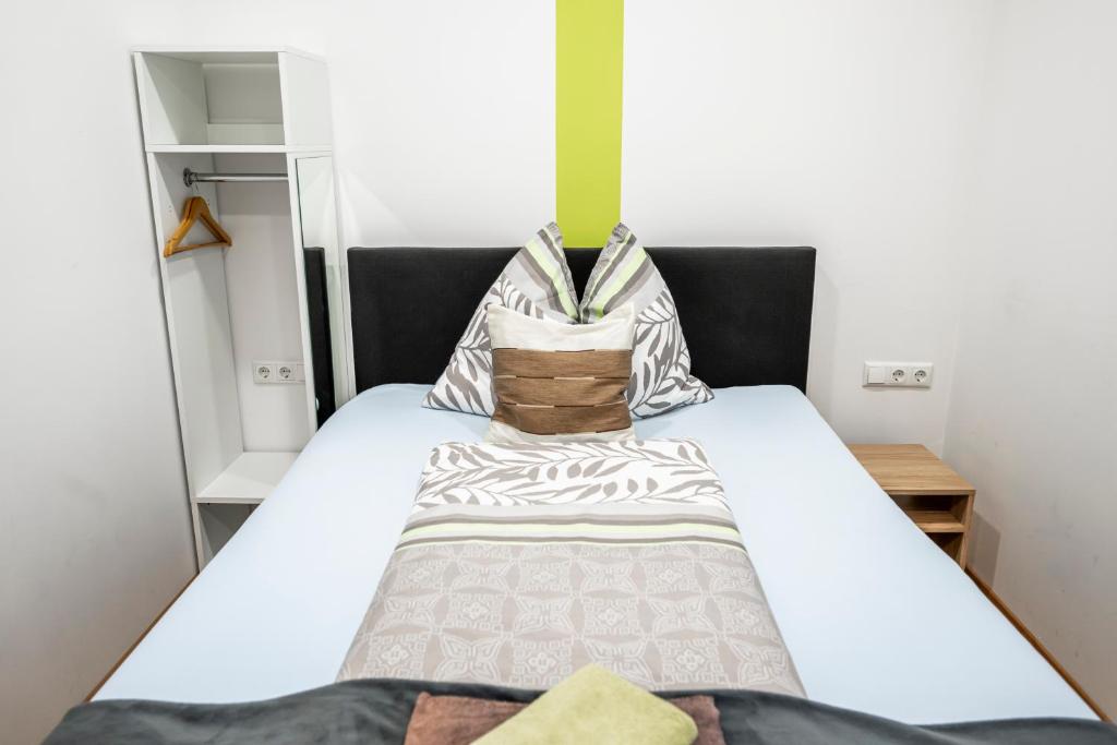 Postel nebo postele na pokoji v ubytování Die Schlafstube - Bed & Breakfast