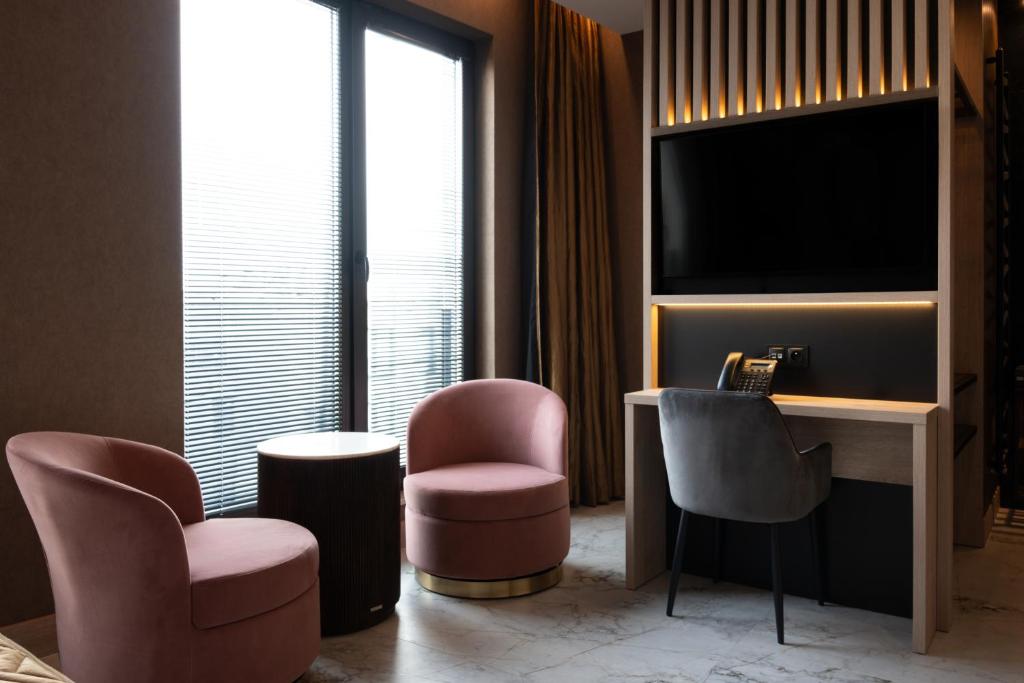 Posezení v ubytování Art Suites Luxury Hotel